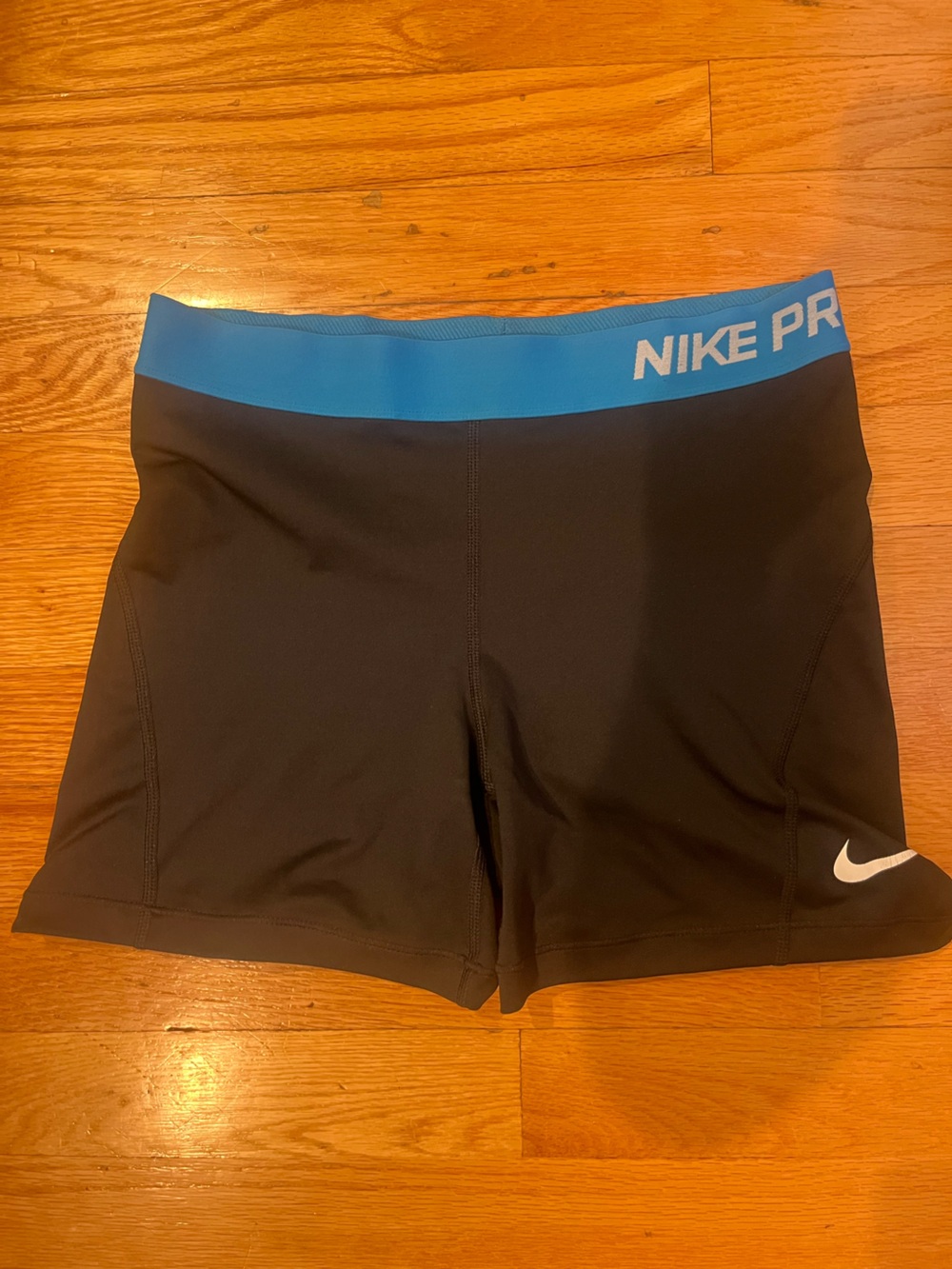 Black Nike pro athletic shorts with Blue Waistband